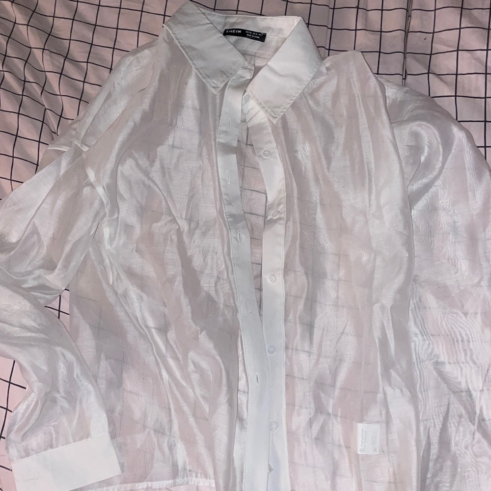 Never worn see through white button down shirt. Size small!